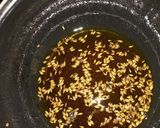 A picture of step 11 of Punjabi kadhi with baked pakoras.
