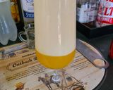 A picture of step 4 of Passionfruit and mango mousse.