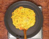 A picture of step 4 of Besan ka chilla.