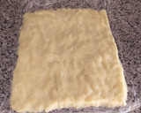 Foto del paso 4 de la receta: Rulo de patata rellena y gratinada
