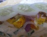 A picture of step 5 of Tortilla wrap filled grilled cheesy white sauce.