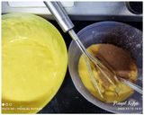 A picture of step 4 of Orange Marble Cake🍊🎂.