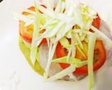 A picture of step 8 of Semolina Avocado cake  veg burger with dal tikki  and stick.