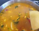 Foto del paso 4 de la receta: Arroz meloso con rape, ajetes y alcachofas