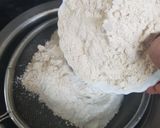 A picture of step 1 of Apple Cake twisted garnishing with milkmaid and honey.
