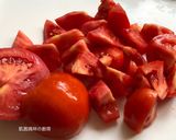 A picture of step 4 of Cucumber and Tomato Vinaigrette Salad.