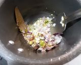 A picture of step 3 of Kathyawadi masala vegetable khichadi with masala curd, papad and 🌶.