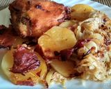 Savanyú káposztás tepsis krumpli, csirkével recept fázis 9 fotója