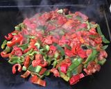 Une image de l'étape 10 de Poivrons et tomates à l'ail et anis vert.