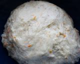 A picture of step 2 of Dumpling/Idombolo.