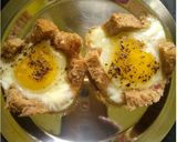 A picture of step 9 of Eggs In Baked Basket.