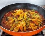 Foto del passaggio 6 della ricetta Orecchiette con cozze, zucchine, fiori di zucchine e pomodori