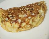 Foto del paso 4 de la receta: Tortilla de gulas, queso y pimientos