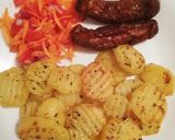 A picture of step 3 of Seasoned potatoes, kachumbari & pork sausages.