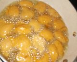 A picture of step 3 of Egg source, chips, akara n fried egg.