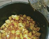 A picture of step 6 of Achari aloo gobhi.