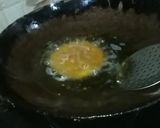 A picture of step 10 of Ashtami special prasaad the puri chana and halwa thali.