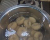 A picture of step 17 of Dal Bafla Baati Churma.
