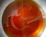 A picture of step 4 of Banana Fritters in Jaggery Syrup.
