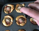 A picture of step 7 of Cheesy Meatball Bites.