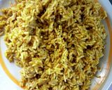 A picture of step 3 of Red oil Rice and blendered scent leave.