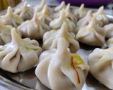 A picture of step 11 of Ukdiche modak.