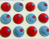 A picture of step 9 of Eggless cupcakesDecorated with buttercream, fondant and marshmallows.