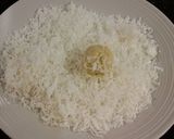 A picture of step 7 of Toasted Coconut Thumbprint Cookies.