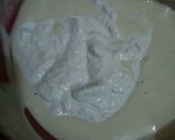 A picture of step 6 of Tahini Chocolate Cake with Coconut Chocolate Mousse frosting.