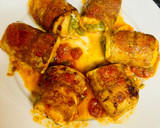 A picture of step 7 of Cod rolls with tomatoes and spinach.