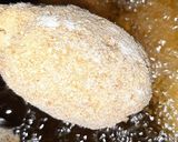 A picture of step 12 of Cheesy chicken drumsticks.