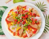Hình bước làm 2 của món Bánh pizza mực,xúc xích,tôm,ớt chuông và hành tây