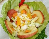 A picture of step 5 of Apple and Cabbage bowl fruit chat.