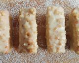 Foto del paso 11 de la receta: Bizcochitos de coco con cobertura crujiente de chocolate blanco y almendras (SIN GLUTEN)