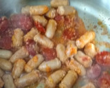 Foto del paso 3 de la receta: Arroz amarillo (con chorizo y salchichas)