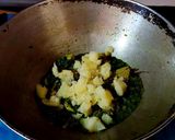 A picture of step 7 of Chingri diye kochu shaak.