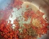 A picture of step 4 of Mexican tomato, chicken and refried bean soup.