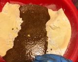 A picture of step 6 of Christmas cookies dipped in honey, aka melomakarona.