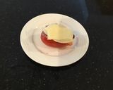A picture of step 6 of Turkey and Ham Club Stuffed Tomato.
