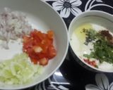 A picture of step 1 of Onion Tomato & Cucumber Raita.