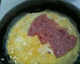 Foto del paso 4 de la receta: Rollitos de tortilla de huevos y jamón