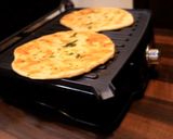 A picture of step 6 of Garlic butter naan.