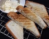 A picture of step 3 of Cheese spread bread toast.