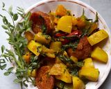 A picture of step 6 of Pumpkin curry.
