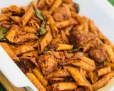 A picture of step 6 of Italian chicken pasta.