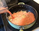 A picture of step 5 of Ovo Con Tomato.