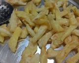 A picture of step 5 of Garlic honey chilli potato.