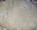 A picture of step 4 of Vanilla cream filled doughnuts.
