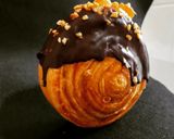 Foto del paso 18 de la receta Espiral de hojaldre relleno de crema de melocotón y chocolate