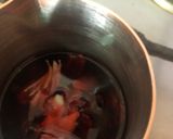 A picture of step 1 of Hibiscus garlic tea.